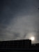 Sun dances over buildings